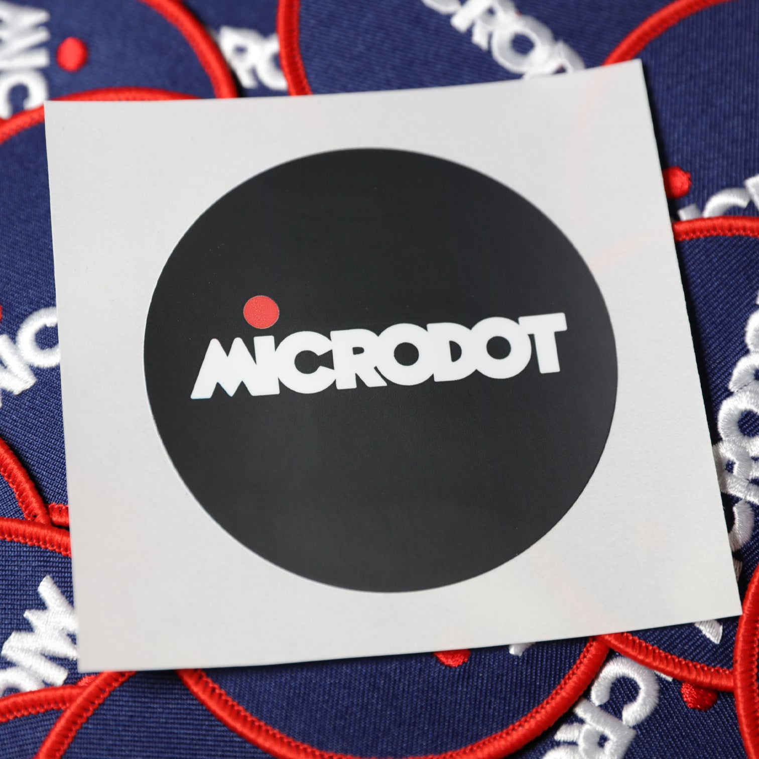 Microdot Logo Woven Patch - With Free Sticker - New Item